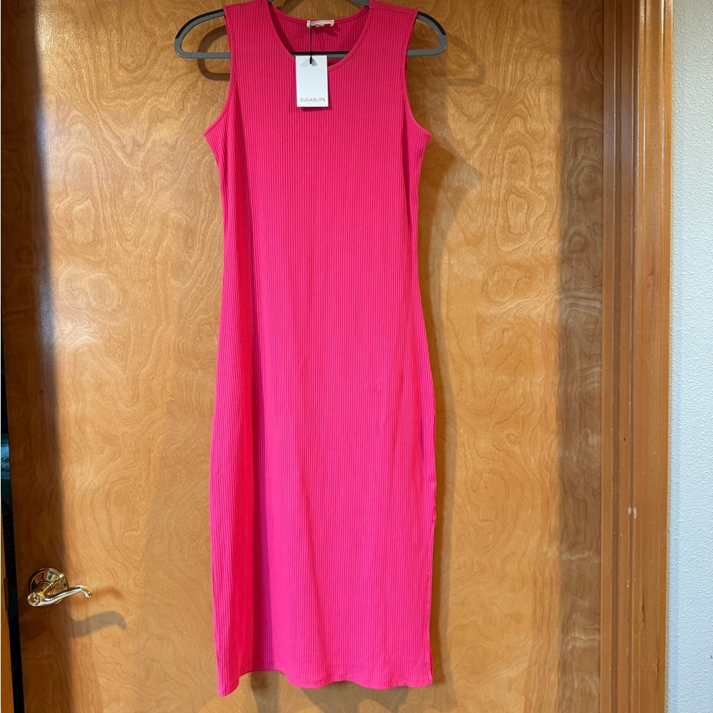 Hot pink tube dress! Follows your curves